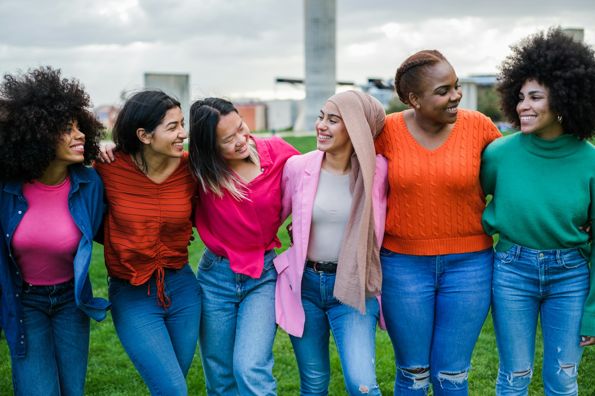 Group of young women from different cultures spending time together