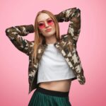 Gorgeous trendy woman posing in studio