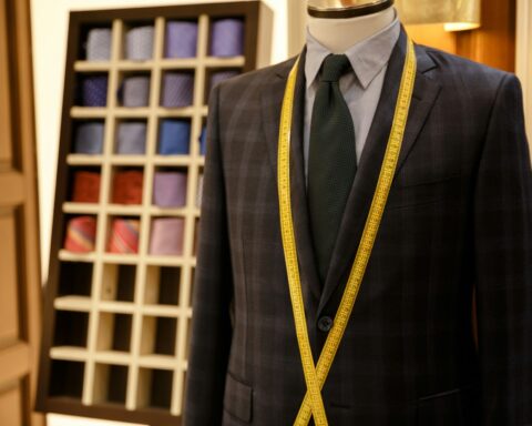 Photo of men suit jackets on hanger