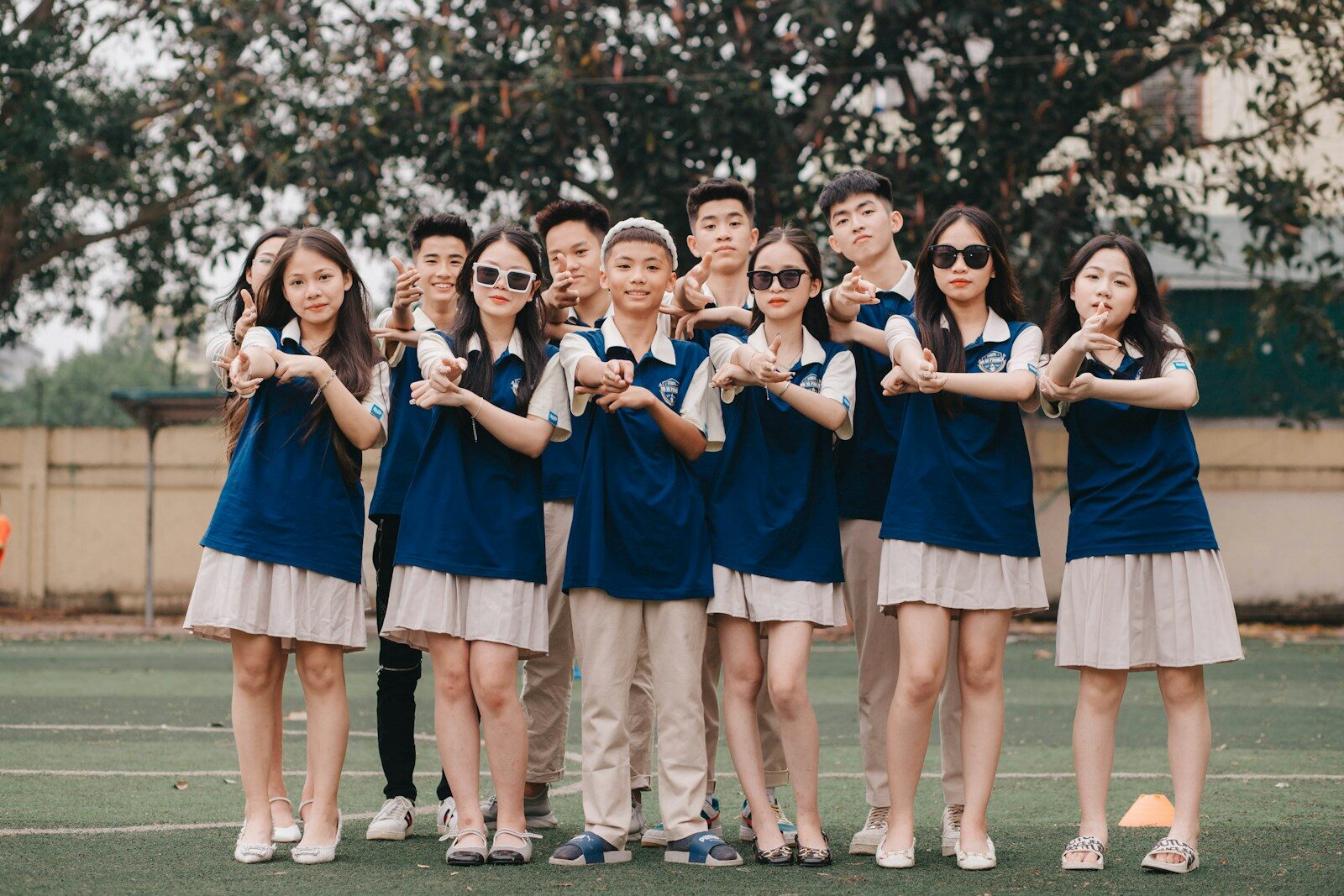 a group of young people standing next to each other