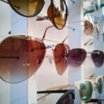 A display of sunglasses in varied styles, illustrating licensed eyewear ranges in fashion