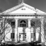 A black and white view of the historic courthouse facade in Hampton, Virginia, showcasing classic architecture.