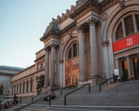 a building with pillars and stairs