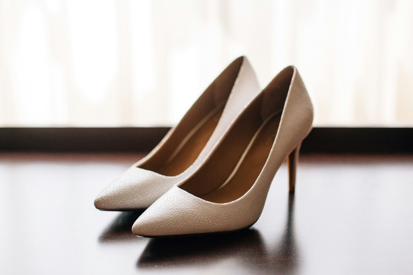 Pair of nude pointed-toe pumps