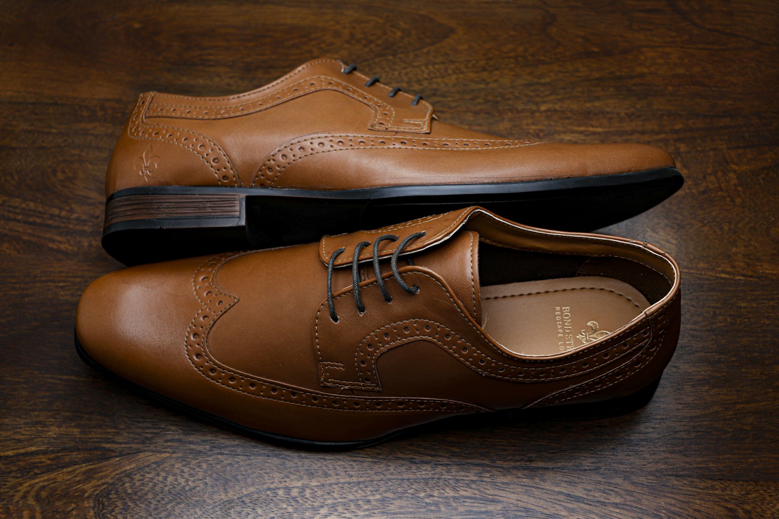 Pair of brown leather oxford shoes