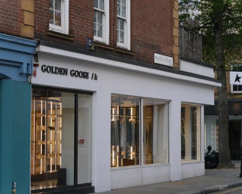 Golden Goose store front on Walton Street, London, with the brand name sign and star logo above the windows