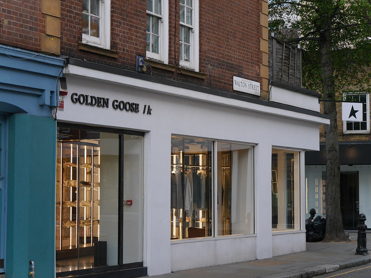 Golden Goose store front on Walton Street, London, with the brand name sign and star logo above the windows